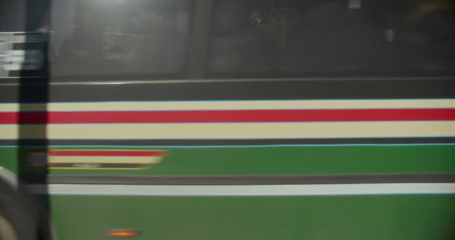 Busy streets of a metropolis with car and bus traffic