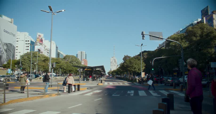 Busy street with vehicle and pedestrian traffic