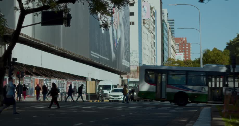 Busy city street with vehicle and pedestrian traffic