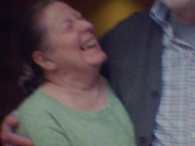 Portrait of a smiling couple embracing
