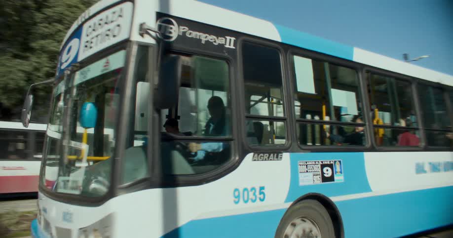 A bus driving on a city road