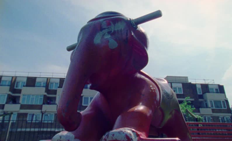 A playground ride rocks back and forth