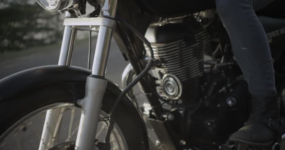 A person is riding a motorcycle on the road