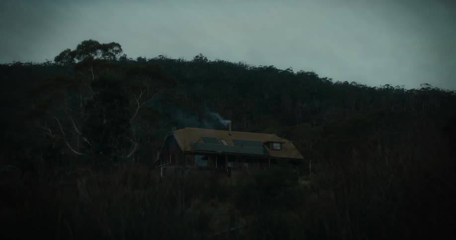 A single home is by the hill