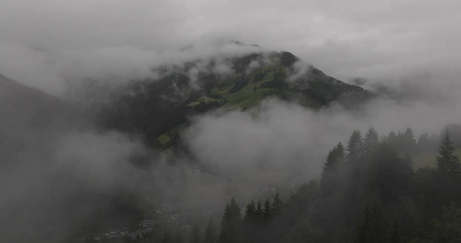 Aerial view on a foggy day with a view of a mountain range