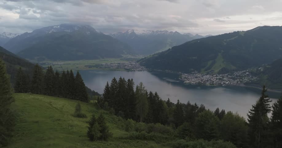 Aerial view of a coastal town nestled in the mountains next to a river