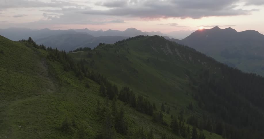 Aerial view of a sunset over a mountainous landscape