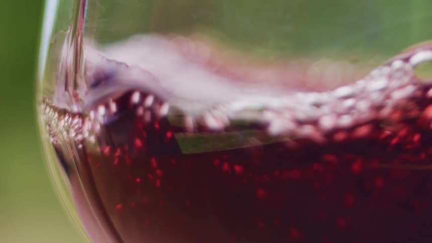 The glass is filled with wine