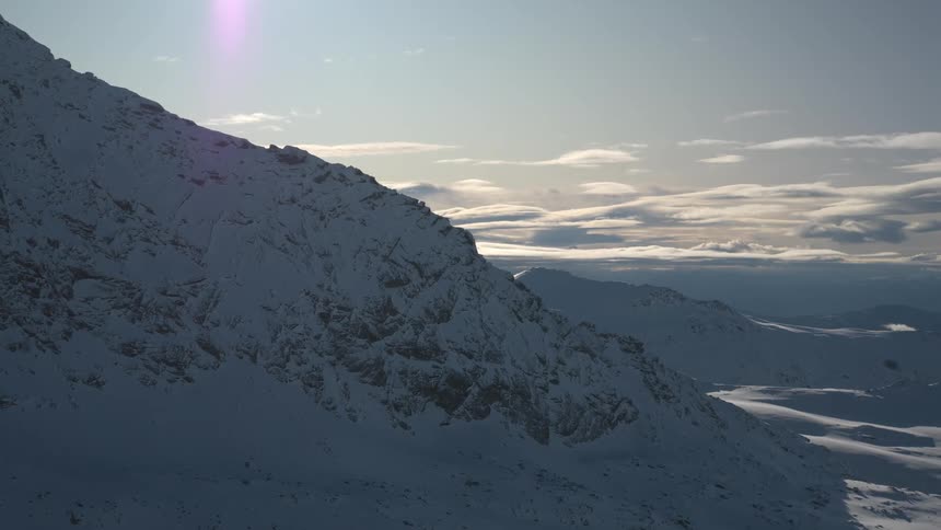 Snowcovered mountains on a bright day