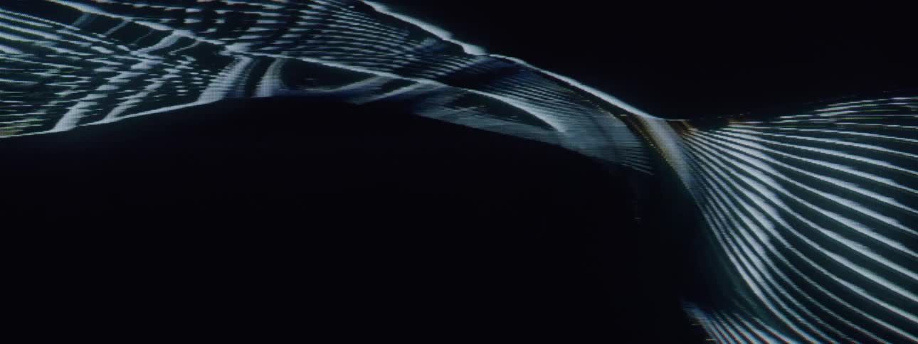 Grainy stripes that twist around each other across the screen