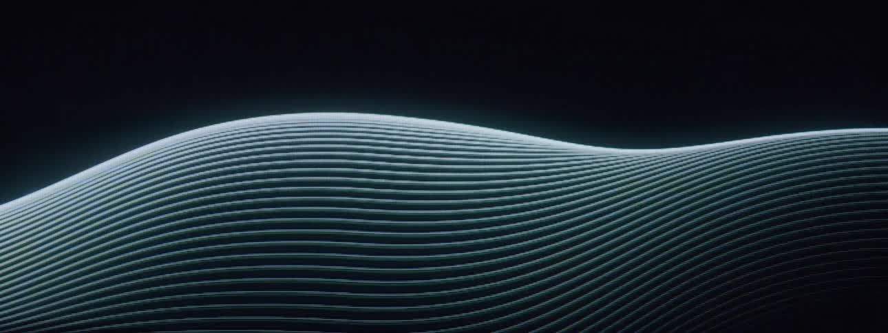 Waves of light flow on a black background