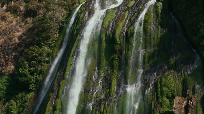 A shelter is by the waterfall