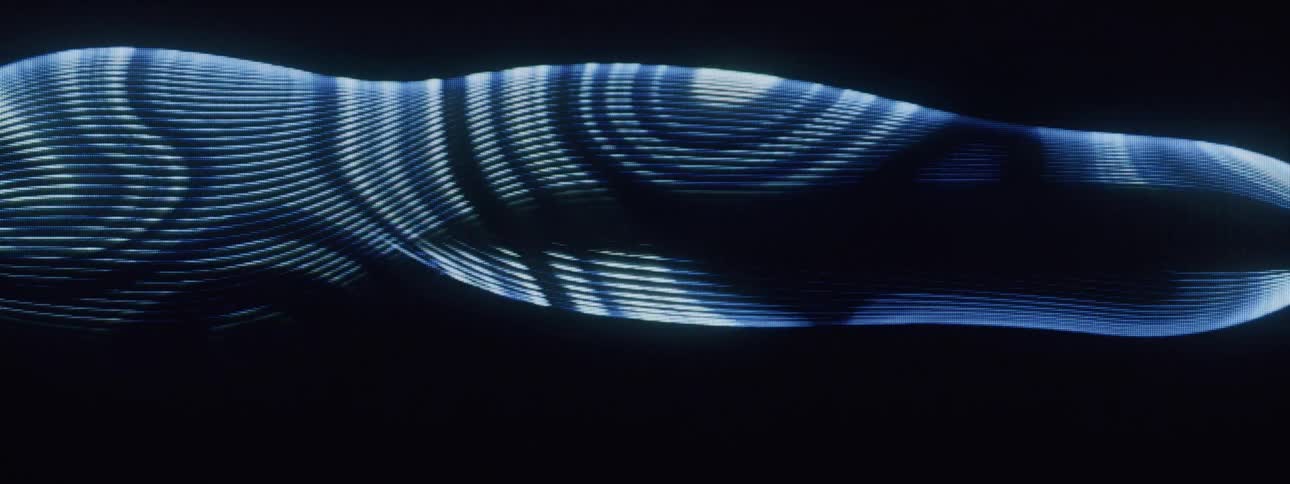 Pattern of wavy lines on a dark background