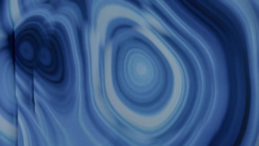Blue and white ripples move amongst eachother