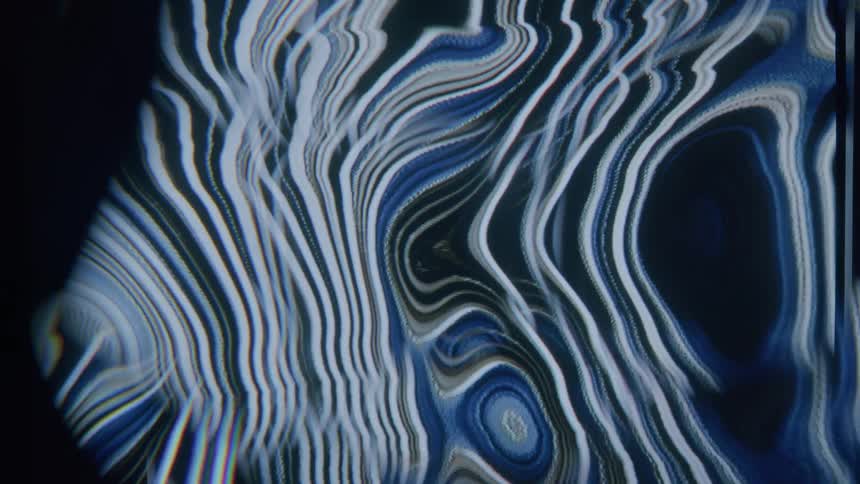 Blue black and white bands of color waves and bend while pooling into circles