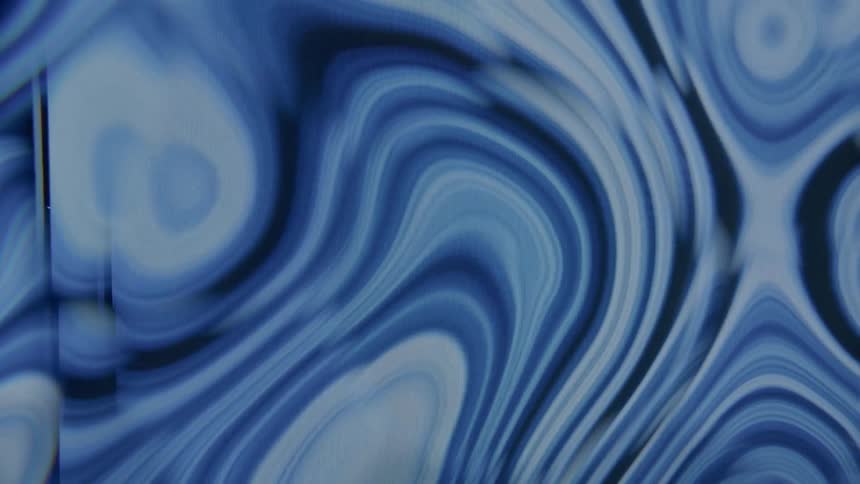 Abstract pattern of blue curved lines