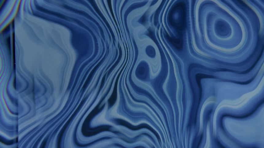 Blue and black spots moving randomly