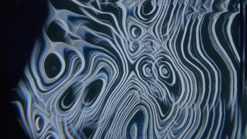 Bluish lines on a black background in psychedelic movement