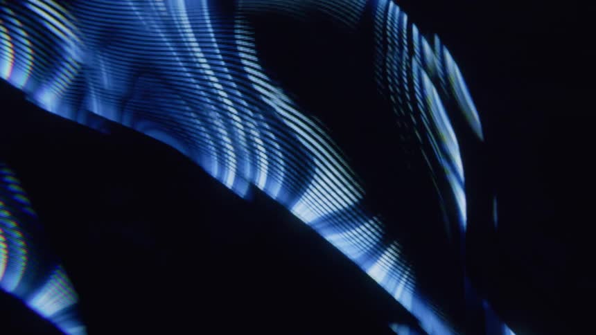 Waves of flashing light glide on the screensaver