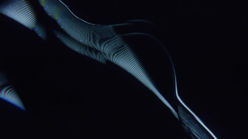 Abstract projection of lines against a black background