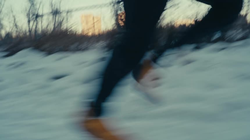 A person running outdoors in snow