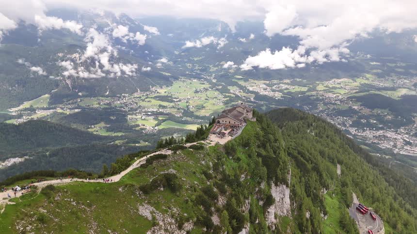 Construction on the cliff of a mountainous valley on a cloudy day
