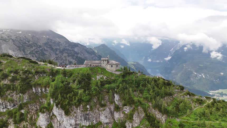 Church on top of a cliff mountain on a cloudy day
