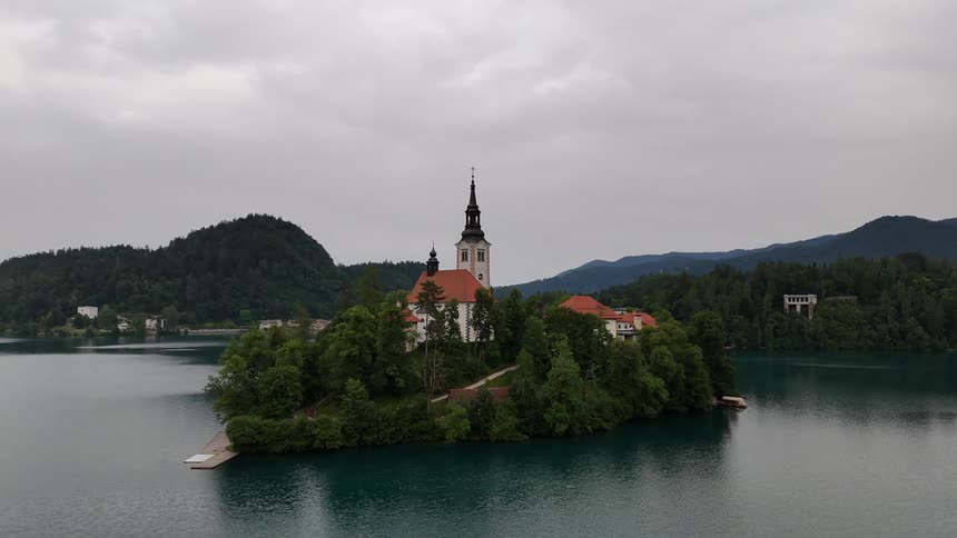 An aerial view of a church on an island