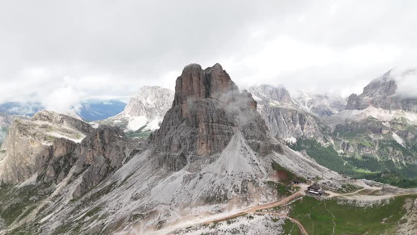 Aerial landscape of rocky mountains in a valley on a cloudy day