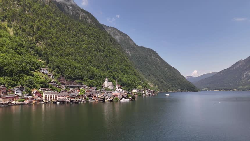 An aerial view of some buildings out near a lake