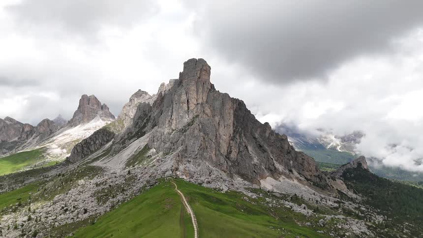 Aerial panorama of rocky mountains with cliffs and natural weathering on a cloudy day
