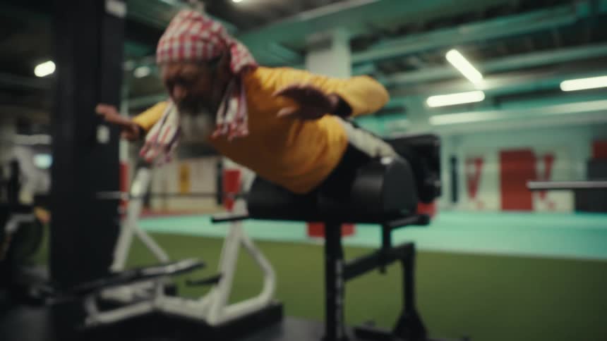 Man doing ab exercises alone at the gym