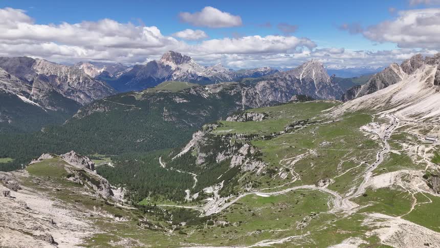 Aerial landscape of a mountain valley on a partly cloudy day