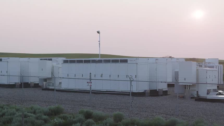 Large grid scale batteries in a rural generating station