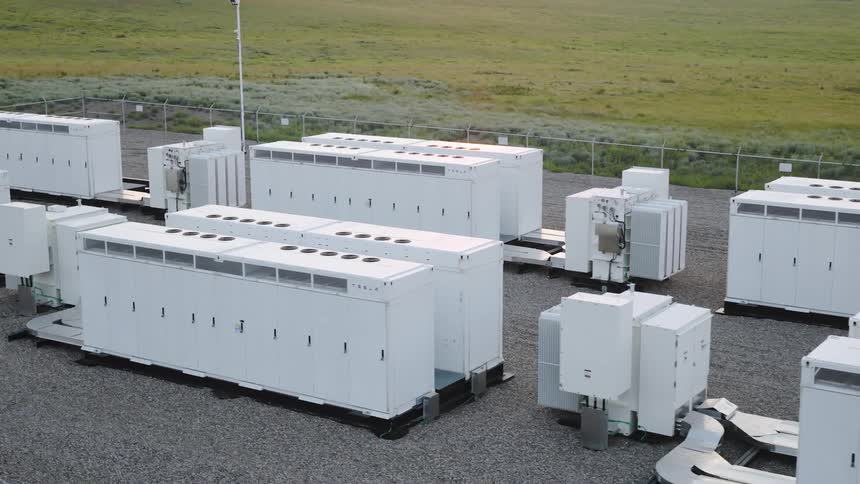 Aerial view showing numerous industrial batteries in rows