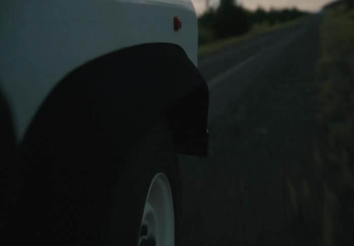 A vehicle is swerving on the road