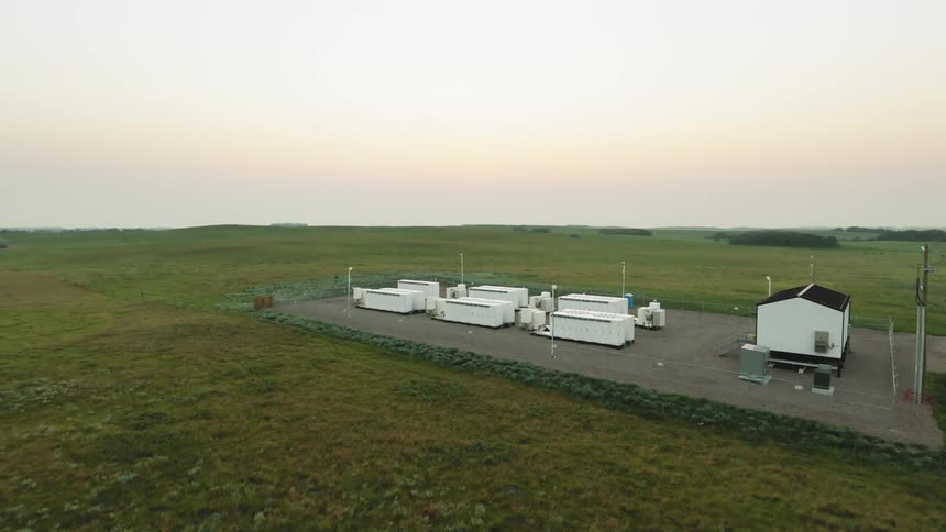 Approaching a battery grid storage system on a hazy morning