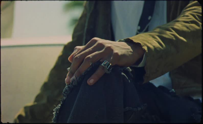 Closeup of a mans hand wearing a ring