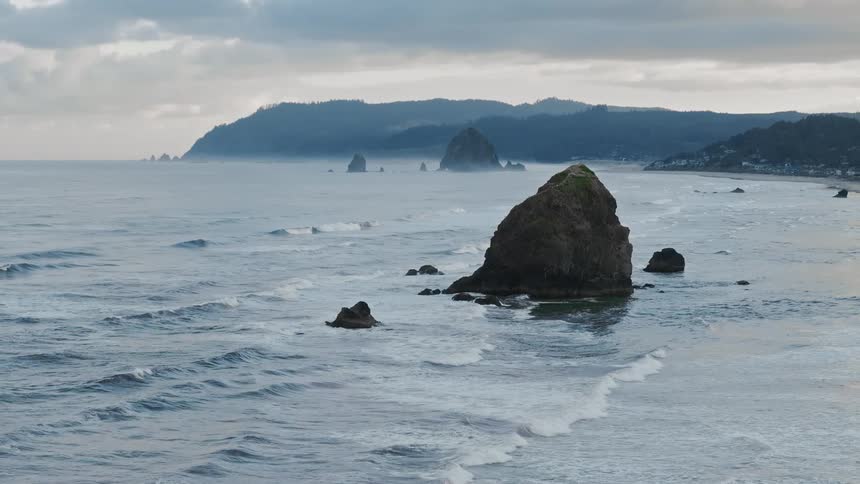 Aerial view of a rocky coastal landscape with prominent rocks formation near the coast