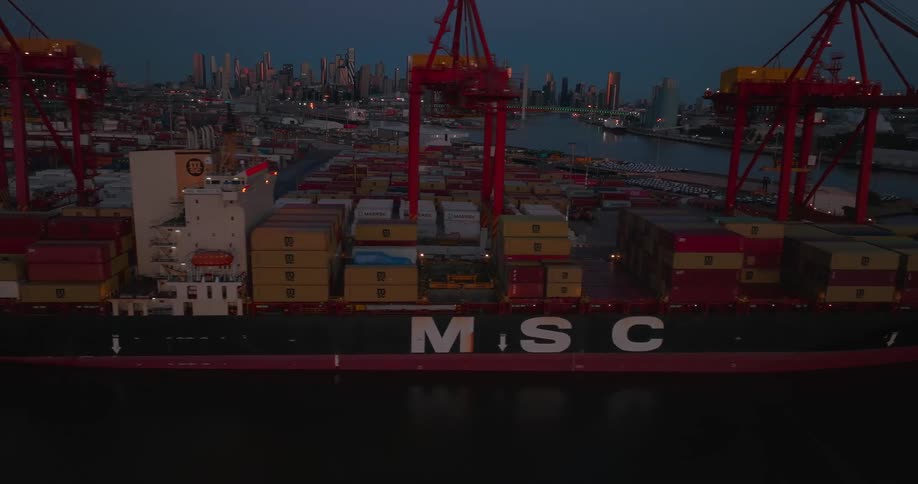 Cargo ship with containers in a port