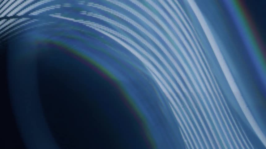 Lines in various colors and thicknesses form patterns in a screensaver experiencing static effects