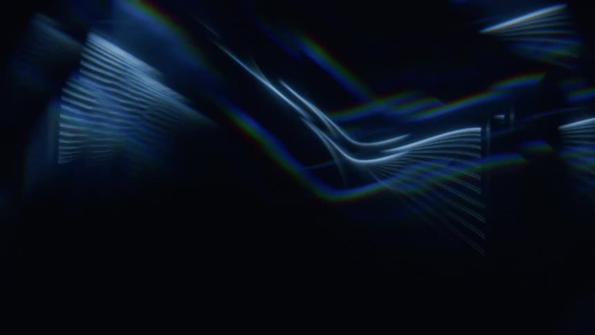 Abstract patterns in shades of blue against a black background