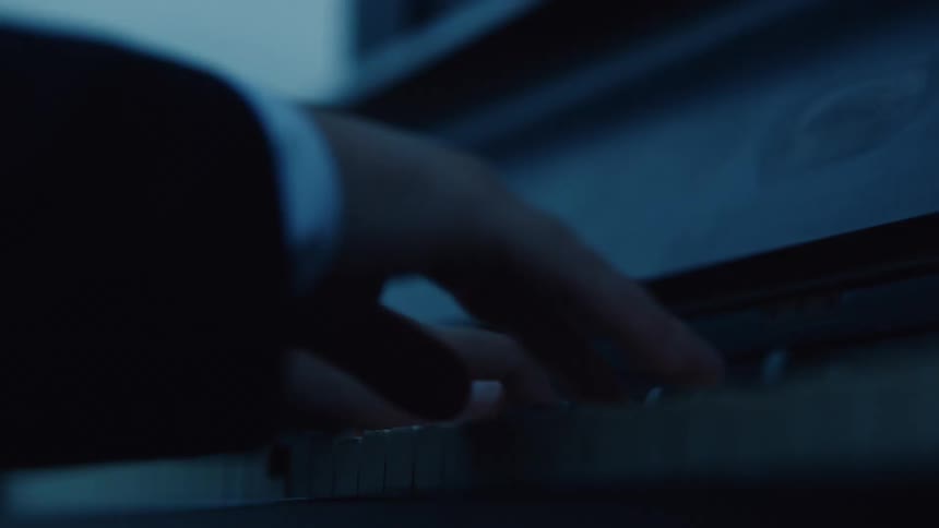 A person is playing the piano