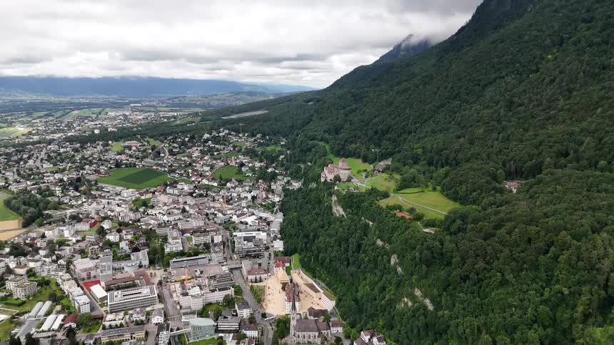 Aerial of a city built in a mountain valley