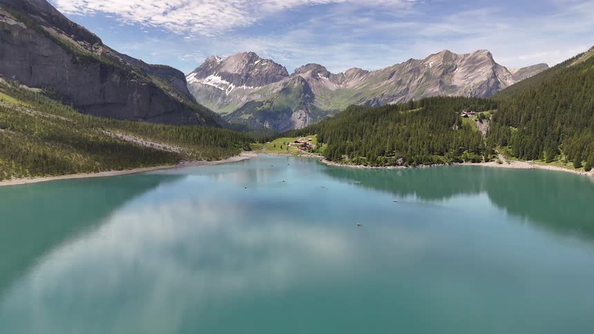 A small rural community on near a valley lake between mountain ranges