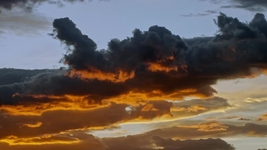 Sky landscape with golden reflections and clouds