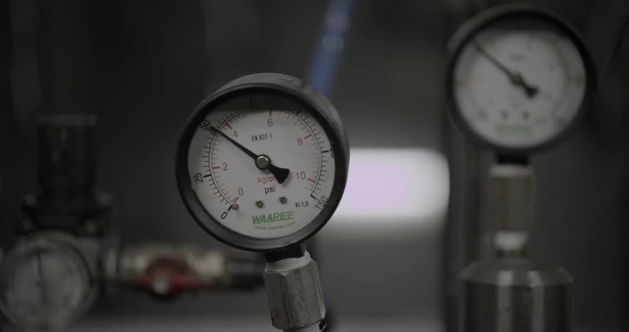 Two gauges fluctuate up and down