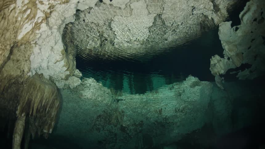 Cave with underwater turquoise blue water