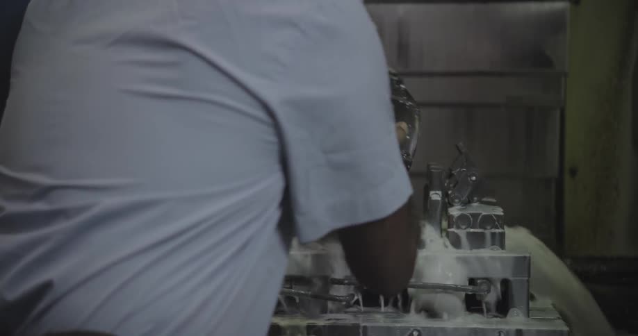 Man spills a bowl of liquid