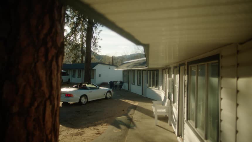 A car pulls up to a house